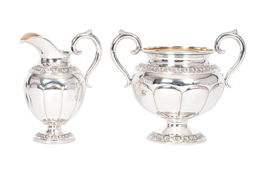 A sugar bowl and jug of Empire style